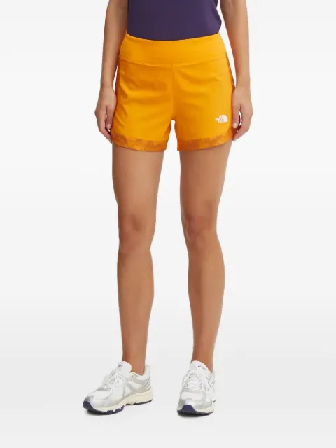 The North Face logo-print panelled shorts Orange NF0A88SE7OA1