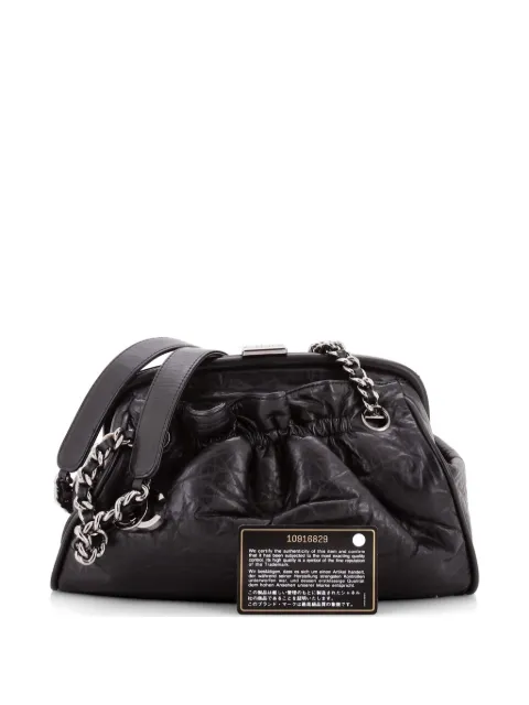CHANEL Pre-Owned Paris-New York Pleated Frame Bag Distressed Lambskin Small shoulder bag Black 77004ZK9APFOUWIX