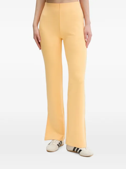 adidas Soft Lux flared trousers Orange KA7002