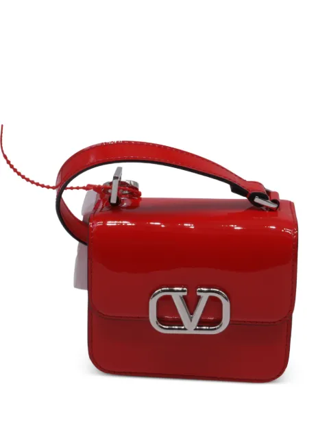 Valentino Garavani Pre-Owned micro V-sling patent-leather cross body bag Red GILTPUUSBA665044W
