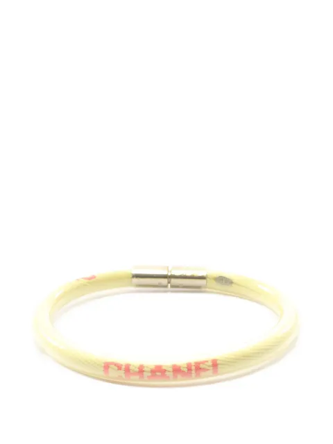 CHANEL Pre-Owned 1986-1988 logo-detail bangle bracelet Gold 1046281