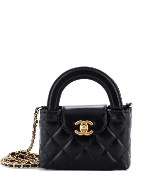 CHANEL Pre-Owned Kelly Top Handle Shopping Bag Quilted Shiny Aged Calfskin Nano crossbody bag Black WXM48JZ9WO4BF1SV