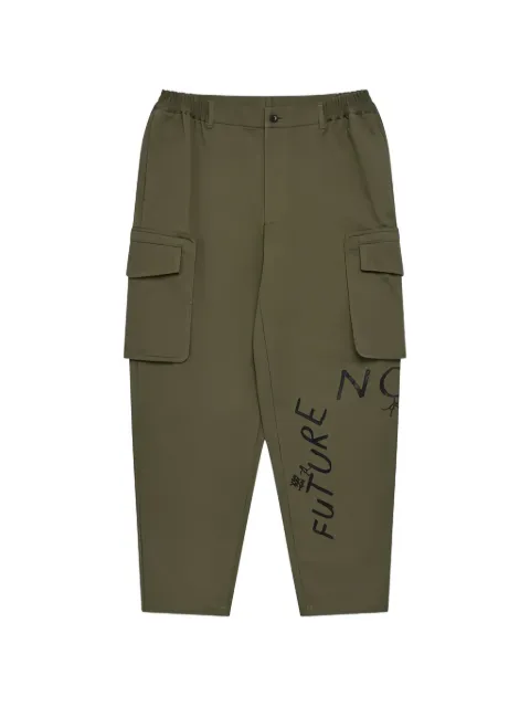 Comme Des Garçons Shirt text-print trousers Green FQP503