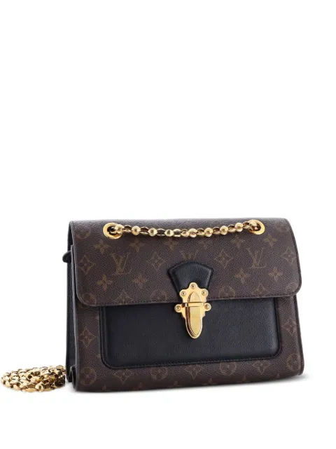 Louis Vuitton Pre-Owned Victoire Handbag Monogram Canvas and Leather shoulder bag Black KTJU4VUSQKGKR1IT