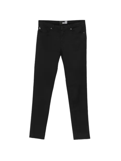 Love Moschino logo-patch slim-fit jeans Black CFWQ43006S3378C74