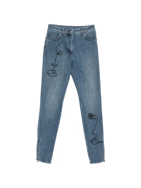Moschino face-embroidery zip-cuff jeans Blue A03080421