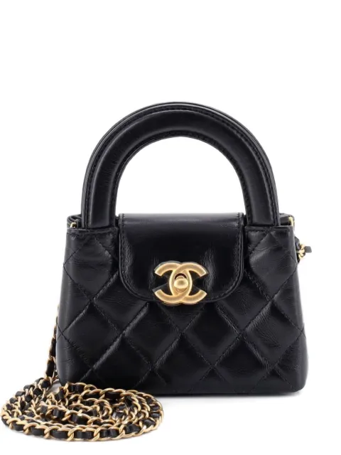 CHANEL Pre-Owned Kelly Top Handle Shopping Bag Quilted Shiny Aged Calfskin Nano crossbody bag Black FDJQM53K20EDEJQE
