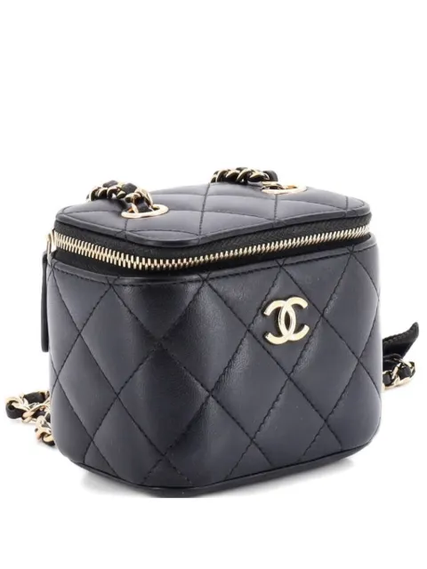 CHANEL Pre-Owned Camellia Bow Vanity Case with Chain Quilted Lambskin Mini crossbody bag Black NWAAYYTO9BU5UMUS
