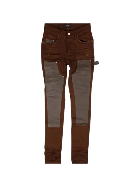AMIRI leather-detail jeans Brown MDS121210