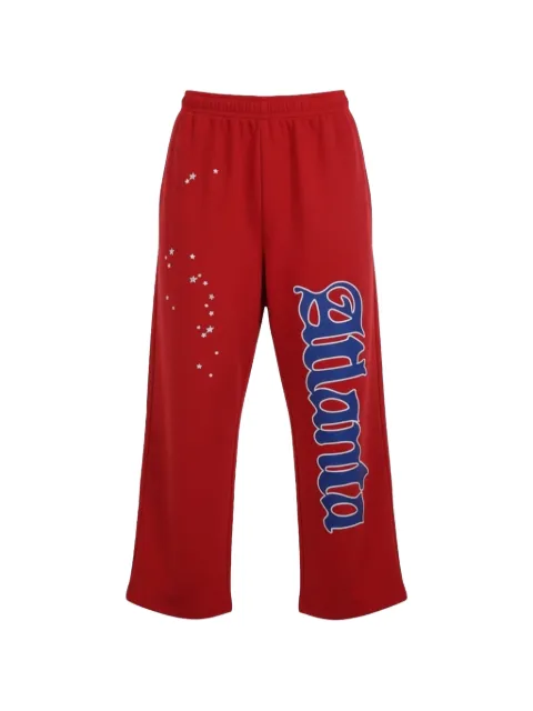 SP5DER atlanta-print track pants Red SP5DER319
