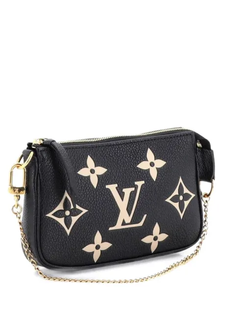 Louis Vuitton Pre-Owned Pochette Accessoires Bicolor Monogram Empreinte Giant Mini clutch bag Black IG4R155WFC5Z7FVX
