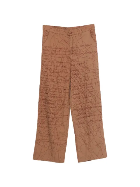 KidSuper embroidered scribble-pattern trousers Brown SS26PT03BRWN