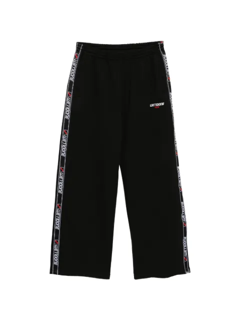 We11done logo-tape trousers Black WDTA026720UBK