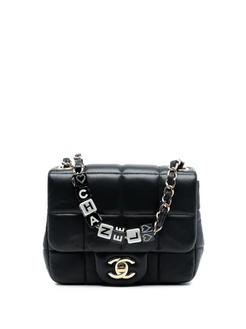 CHANEL Pre-Owned 2021-2025 Mini Square Lambskin Resin Crystal Monacoco Flap crossbody bag Black F36UW7OIP4AX7SGK