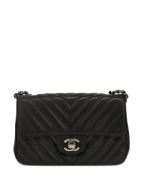 CHANEL Pre-Owned 2018 mini Timeless quilted logo shoulder bag Black 413387