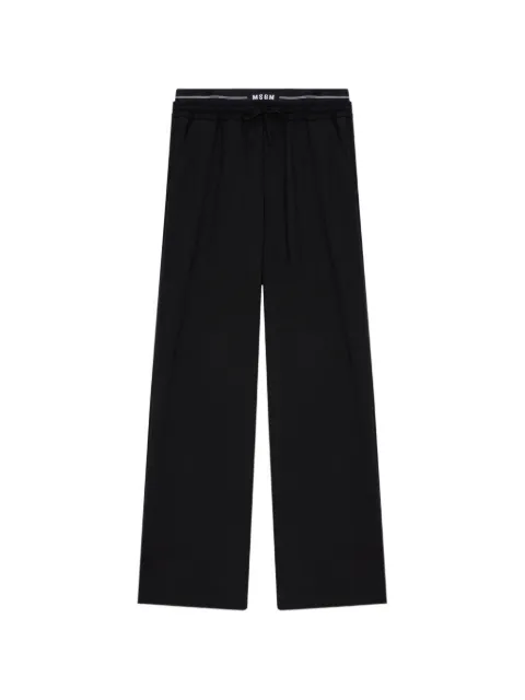 MSGM drawstring-fastening logo-waistband trousers Black 4040MP13267100