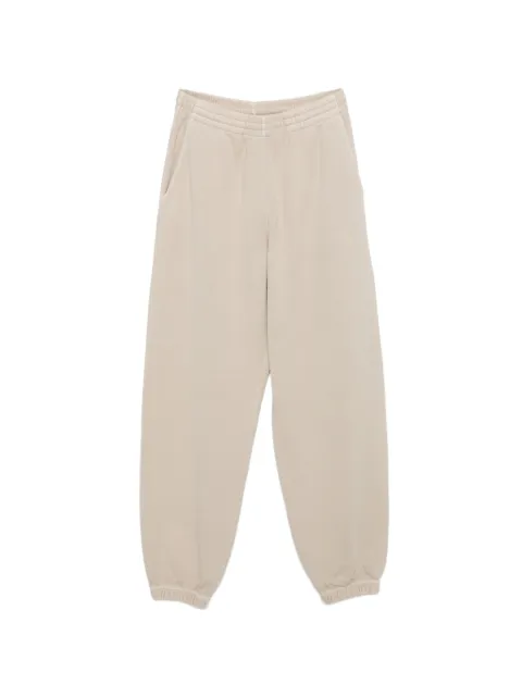 Haikure logo-detail pocket track pants Neutrals HEW54144TJ057