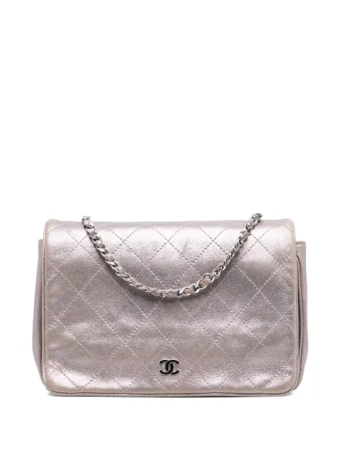 CHANEL Pre-Owned 2013-2014 CC Quilted Metallic Lambskin Wallet On Chain crossbody bag Pink BQSAODBPN5XJWNL3