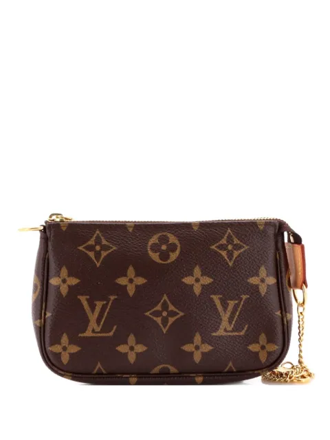 Louis Vuitton Pre-Owned Pochette Accessoires Monogram Canvas Mini clutch bag Brown N187XUIMDDK51YIH