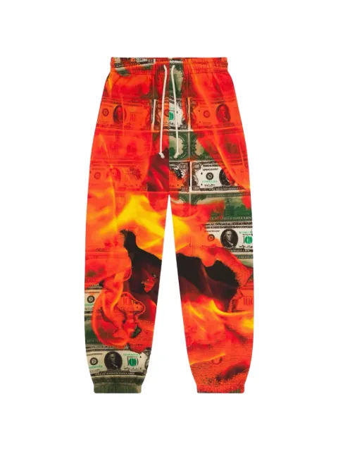 Denim Tears Burn It All printed track pants Orange DT319