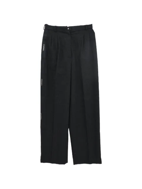 CHANEL Pre-Owned 1990-2000s logo-tape trousers Black 122054