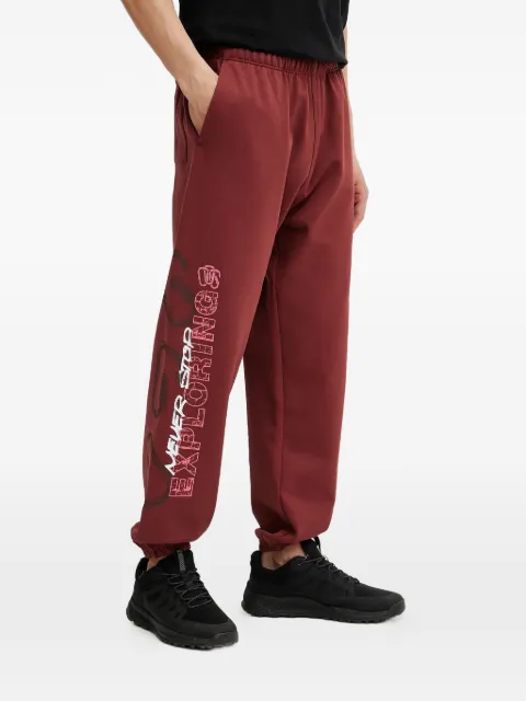 The North Face logo print trousers Red NF0A826J
