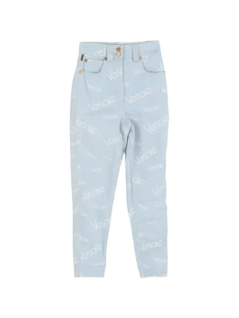 Versace Pre-Owned logo-pattern high-waisted jeans Blue NAPPUGBCL550312W