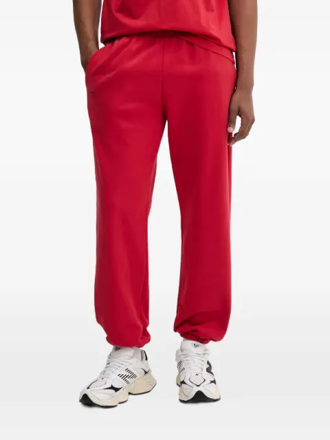 Pangaia logo-print cuffed track pants Red 10000295