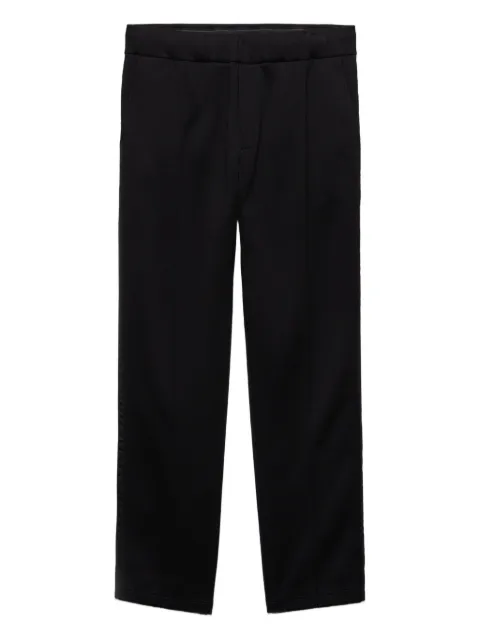 Prada logo-plaque trousers Black UJP290SOOO11JE
