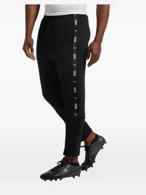 PUMA logo-detail track pants Black 65583701
