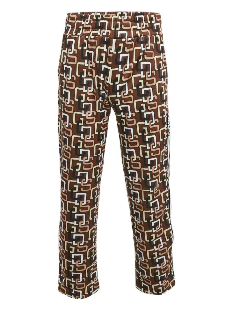 GCDS logo-pattern track pants Brown 1206421