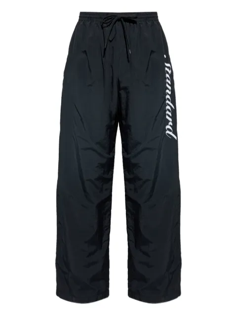 Balenciaga Standard-script track pants Black 850708TTO04