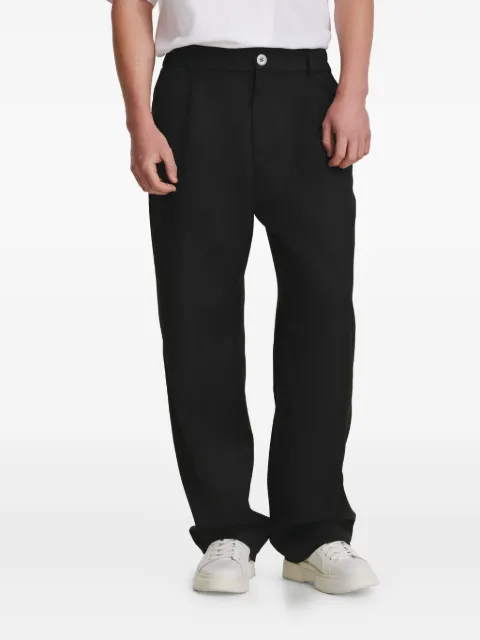 IRINA VOINEA button-fastening trousers Black IVYIC03