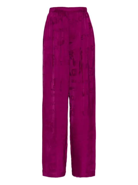 Balenciaga logo-pattern trousers Purple 850696TTO52