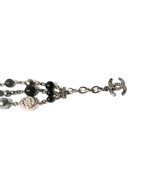 CHANEL Pre-Owned beaded logo-charm bracelet Silver DPBT8904