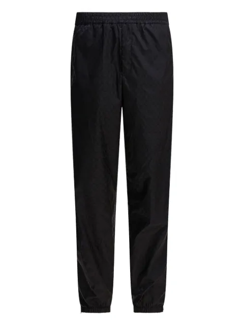 Alexander McQueen skull-jacquard track pants Black 842998QRACA1000