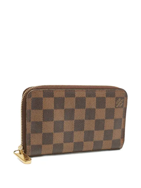 Louis Vuitton Pre-Owned 2010 Damier Ebene zip-around wallet Brown 1155041