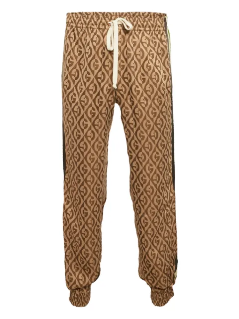 Gucci Pre-Owned 2000s GG-pattern side-stripe trousers Brown 1168110