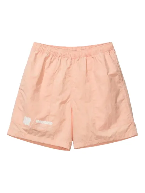 Undefeated logo-print tie-dye shorts Orange TWBFFONV