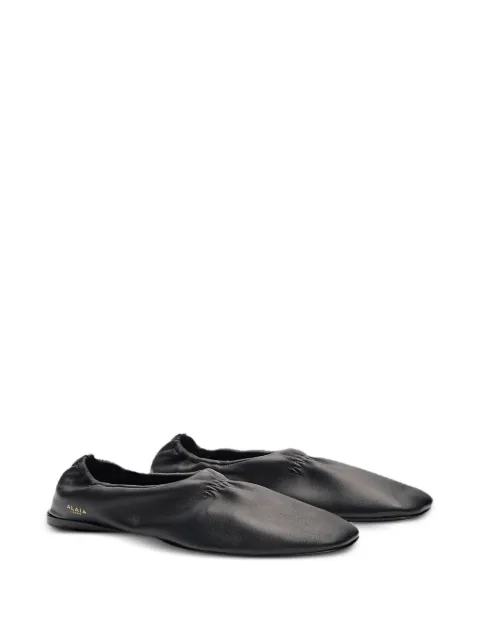 Alaïa supple slippers in leather Black AA3A1024I100