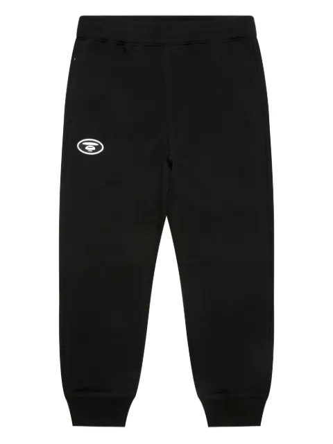 AAPE BY *A BATHING APE® embroidered-logo cuffed track pants Black APTC644XXP