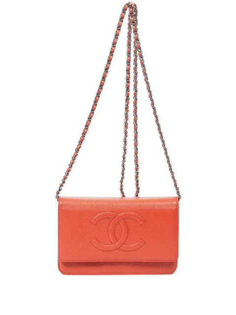 CHANEL Pre-Owned embossed-CC crossbody bag Red 175399811