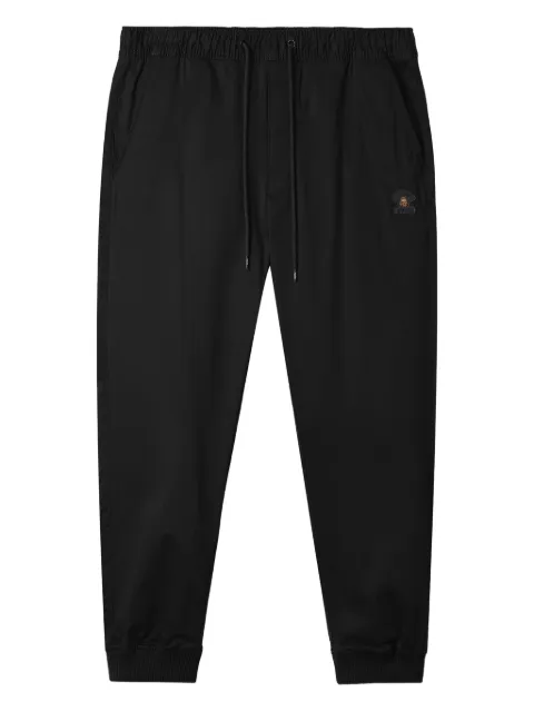 FINGERCROXX logo-patch cuffed trousers Black FFXPTM01060X