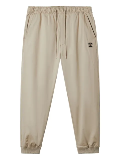 FINGERCROXX logo-patch cuffed trousers Neutrals FFXPTM01060X