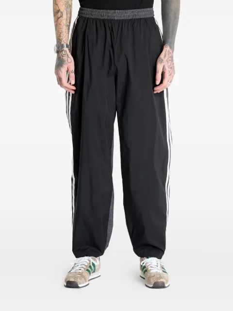 adidas three-stripes panelled track pants Black KA3815