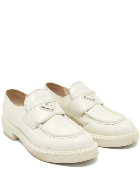 Prada Pre-Owned leather plaque loafers Neutrals 1158377