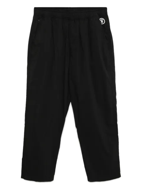 AAPE BY *A BATHING APE® logo-plaque trousers Black APTC628XXP