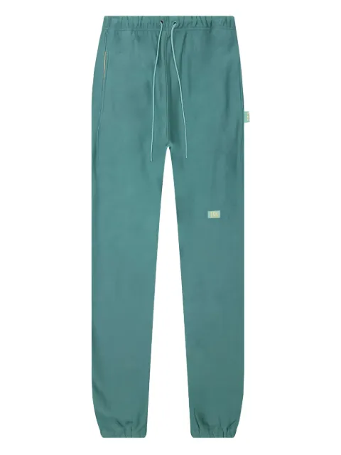 Advisory Board Crystals logo-patch cuffed track pants Green ABC123SPLW100APA