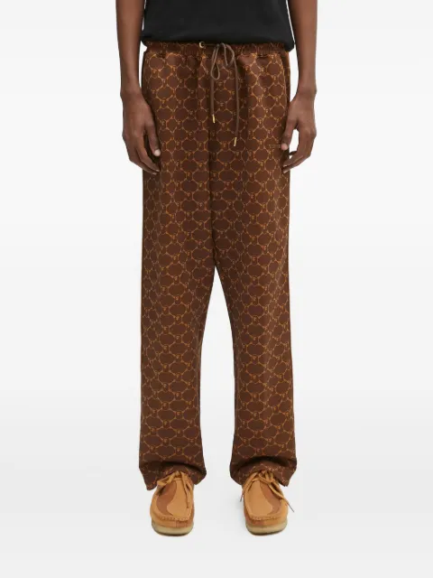 A BATHING APE® logo-print side-stripe trousers Brown 1L30152311