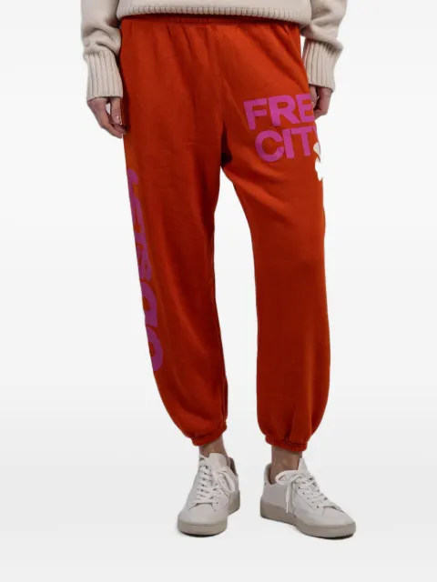 FreeCity logo-print track pants Orange FCBSWP081